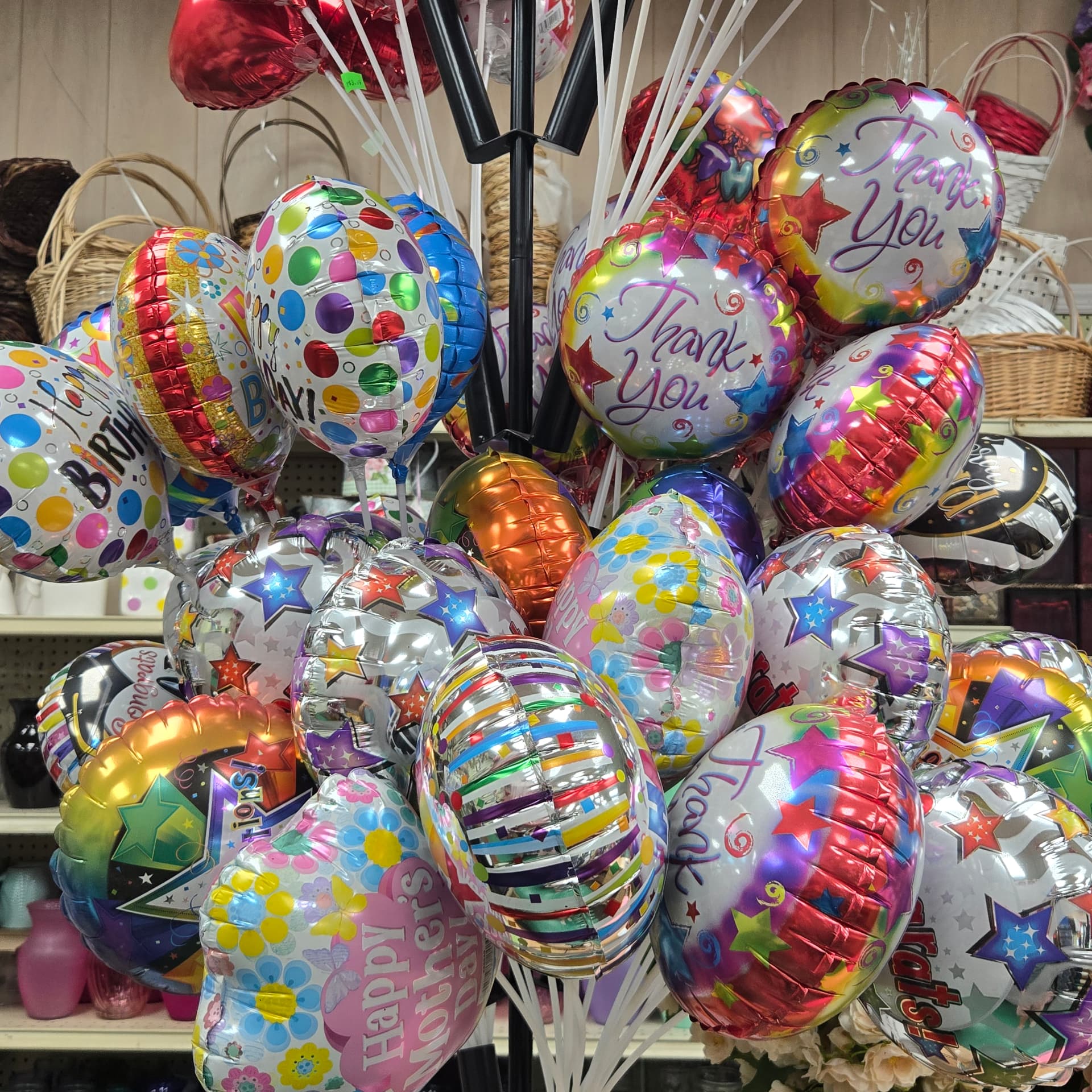 Foil balloon tree with birthday, thank you and congratulations balloons